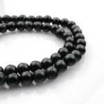 Siyah Kaplan Gözü doğal taş dizi 6mm – siyahın asaletiyle koruma, denge ve zihinsel güç enerjisi sağlayan toptan doğal taş dizi.