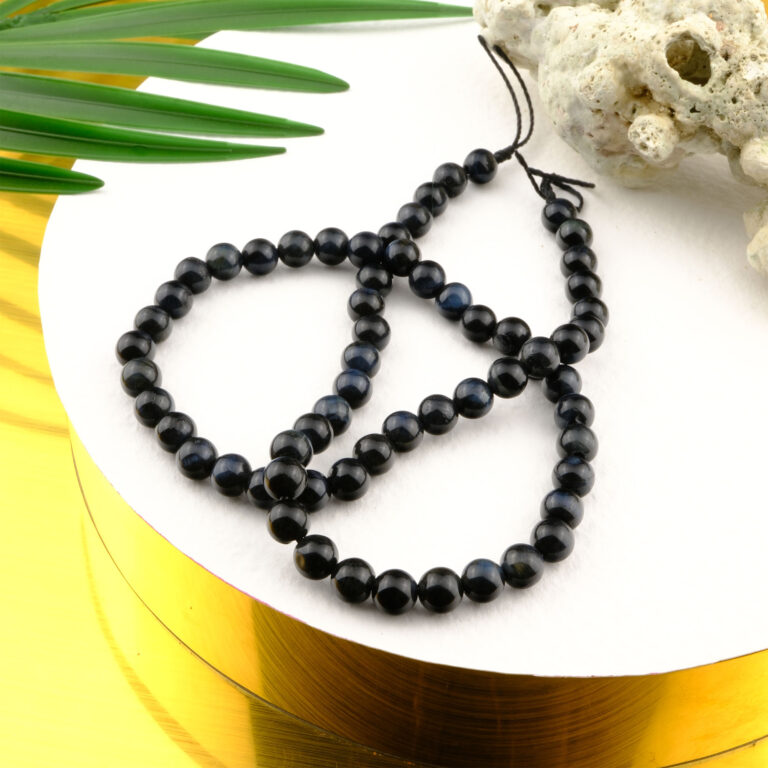 Siyah Kaplan Gözü doğal taş dizi 6mm – siyahın asaletiyle koruma, denge ve zihinsel güç enerjisi sağlayan toptan doğal taş dizi.