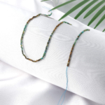 toptan doğal taş dizi desenli turkuaz, 2mm ölçüsü ve doğal damar desenleriyle takı üretimi için estetik ve karakterli kullanım sunan doğal taş dizi