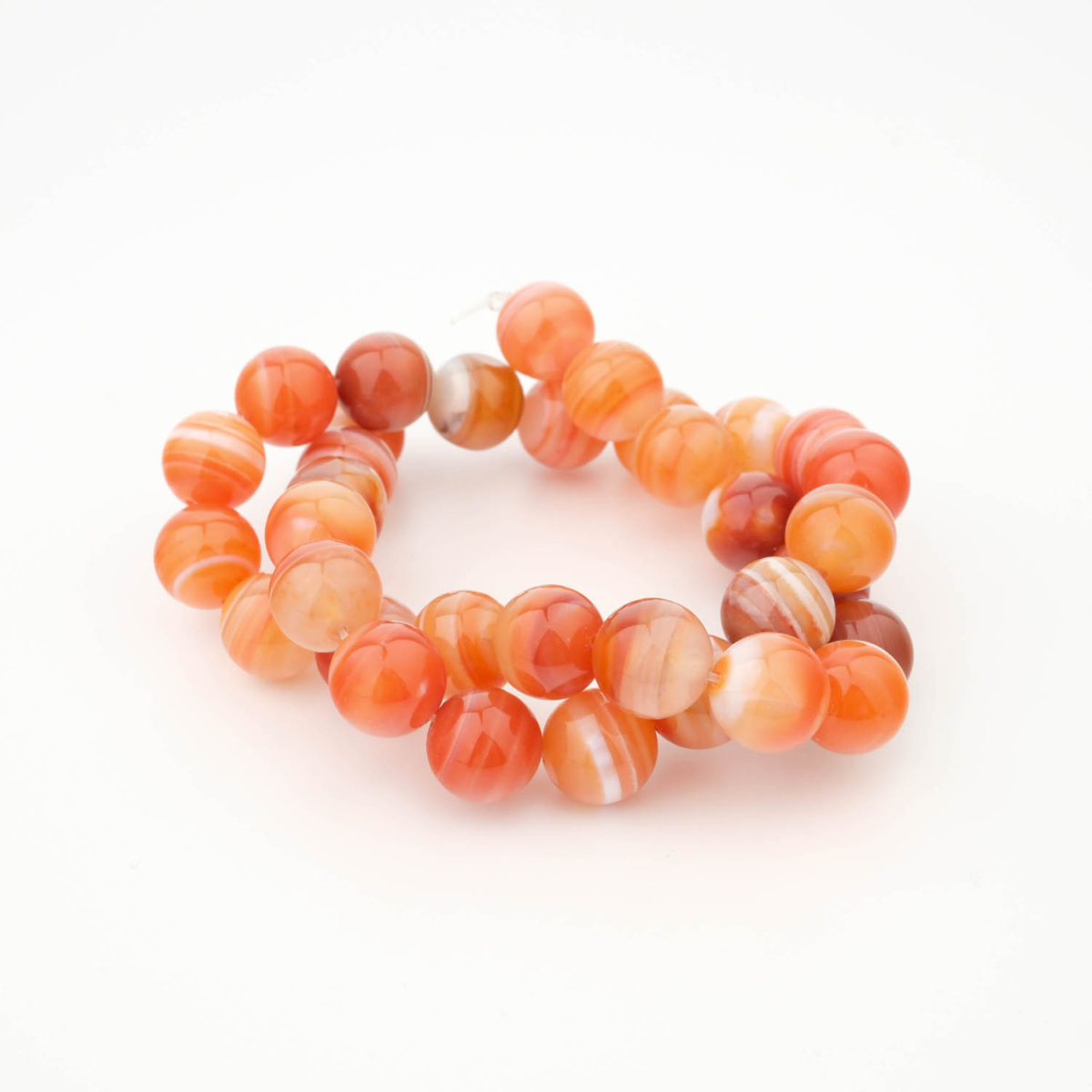 Fil de perles en pierre naturelle d'agate cornaline 12mm dans les tons orange.