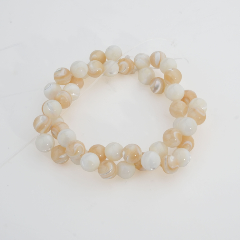 8mm mother of pearl natural stone bead strand in white and brown tones.