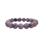 A flexible rolex cut natural stone bracelet made of round smooth purple veined 5A+ quality charoite beads.