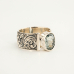 925 sterling silver mens ring featuring an oval facet cut original aquamarine natural stone and masterfully engraved surroundings.