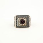 925 sterling silver men's ring featuring an octagonal facet cut original garnet natural stone in a square frame with handcrafted floral motifs.
