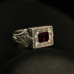 925 sterling silver men's ring featuring a rectangular facet cut original garnet natural stone in a square frame with handcrafted floral motifs.
