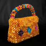 Bolso de lujo de piedra natural hecho a mano con aproximadamente 2000 piezas de piedras de ágata de Madagascar multicolores originales de talla faceta de 8 mm.