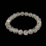 Bracelet flexible en pierre naturelle fait de perles rondes et lisses de quartz clair de 8-9mm avec des inclusions de rutile noir de qualite 6A+.
