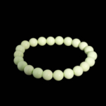 A luxury flexible natural stone bracelet made of 8-9mm round smooth lemon turquoise beads.
