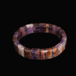 A luxury rolex cut flexible unisex bracelet made of original phantom quartz natural stone featuring internal mineral inclusions.
