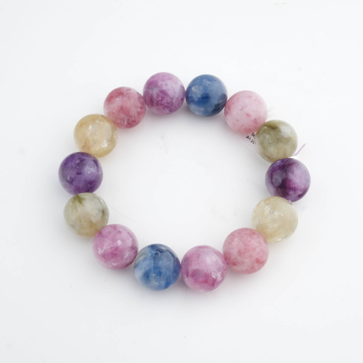 Bracelet au design flexible composé de grosses perles de 15 à 16 mm de pierres naturelles de cyanite et de lépidolite de qualité 4A+.