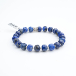 Dark blue rondel faceted original lapis lazuli natural stone bracelet featuring golden pyrite specks.