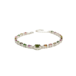 A luxury designer women's bracelet featuring original faceted cut multicolor tourmaline stones set in 925 sterling silver with a central dark green tourmaline focus and extension chain.