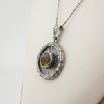 925 sterling silver necklace featuring a round facet cut original citrine natural stone with radiant silver details and handcrafted motifs.