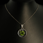 925 sterling silver necklace featuring a round facet cut original peridot natural stone and floral petal prong details.
