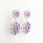 A luxury designer earrings featuring original faceted oval and teardrop purple amethyst gemstones set in 925 sterling silver with zircon accents.