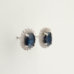 Boucles d'oreilles de luxe en argent sterling 925 ornées de pierres de saphir bleu originales coupe ovale et d'un halo de zircon.
