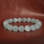 Bracciale flessibile in pietra naturale realizzato con perle rotonde e lisce di acquamarina blu chiaro traslucido da 10-11mm.