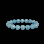 Bracelet en pierre naturelle de calcite bleue originale aux grandes perles de 11-12mm de couleur bleu pastel.
