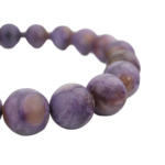 Pulsera flexible de piedra natural hecha de cuentas redondas y lisas de charoita morada veteada de calidad 5A+.