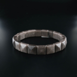 Bracelet élégant coupe rolex fabriqué en pierre naturelle d'obsidienne argentée originale avec un éclat argenté.