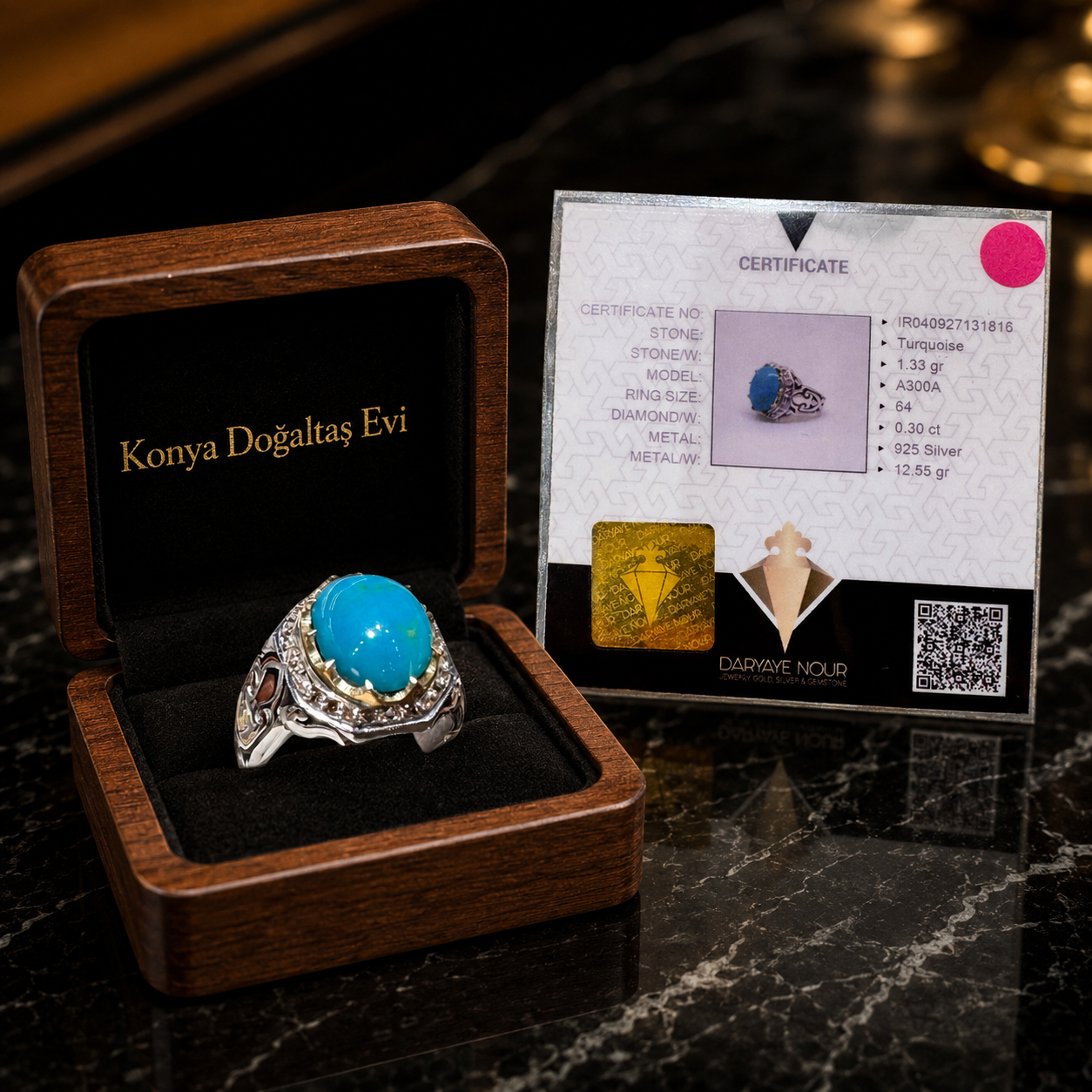 sertifikali-turkuaz-firuze-pirlantali-gumus-yuzuk Handcrafted 925 sterling silver ring featuring a 1.33 gram original turquoise stone and 0.30 carat diamonds, displayed in a custom wooden box with a certificate.