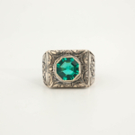 Anello da uomo in argento 925 con una pietra naturale di topazio colore paraiba originale con taglio a faccette in una cornice quadrata con motivi floreali fatti a mano.