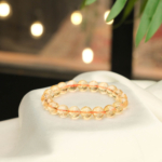 A luxury statement gemstone bracelet featuring original 9-10mm 8A+ VIP grade faceted citrine quartz beads on a stretch band.