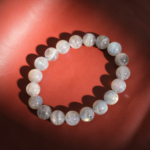 A luxury statement bracelet featuring original 11-12mm 5A+ grade labradorite round beads with intense flash.