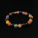 A luxury natural stone bracelet made of original mixed color agate 8mm round beads with a silver metal accent.