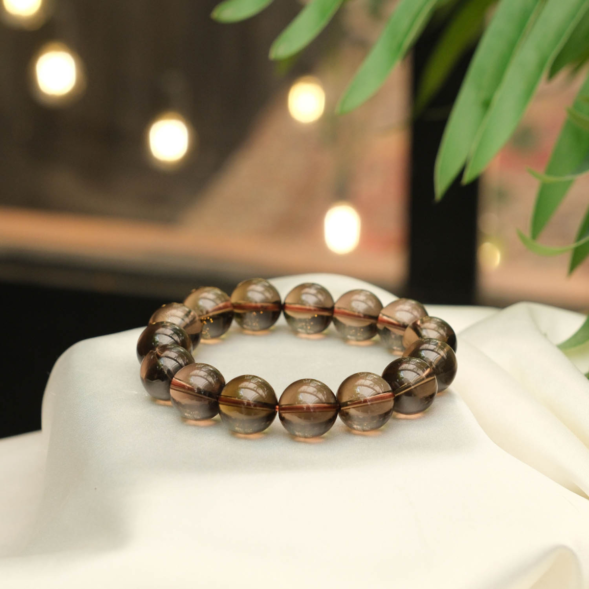 Design-Armband aus originalen 14-15mm 6A+ Rauchquarz-Natursteinen im glatten Rundperlen-Schliff.