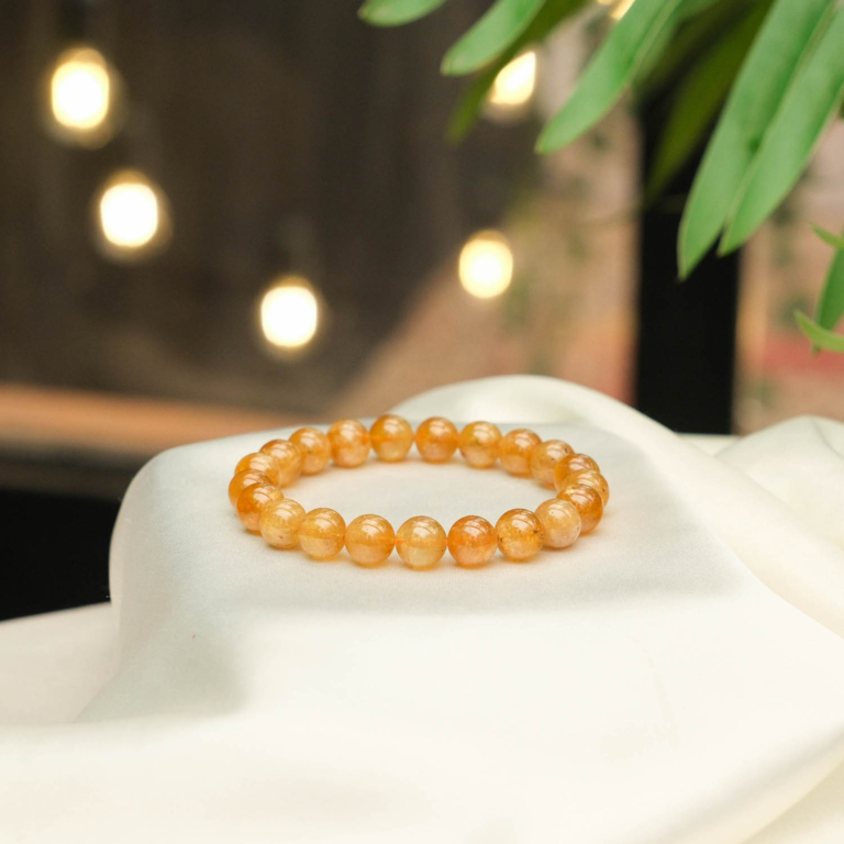 Design-Armband aus originalen 8-9mm gelben und orangen Turmalin-Natursteinen im glatten Rundperlen-Schliff.