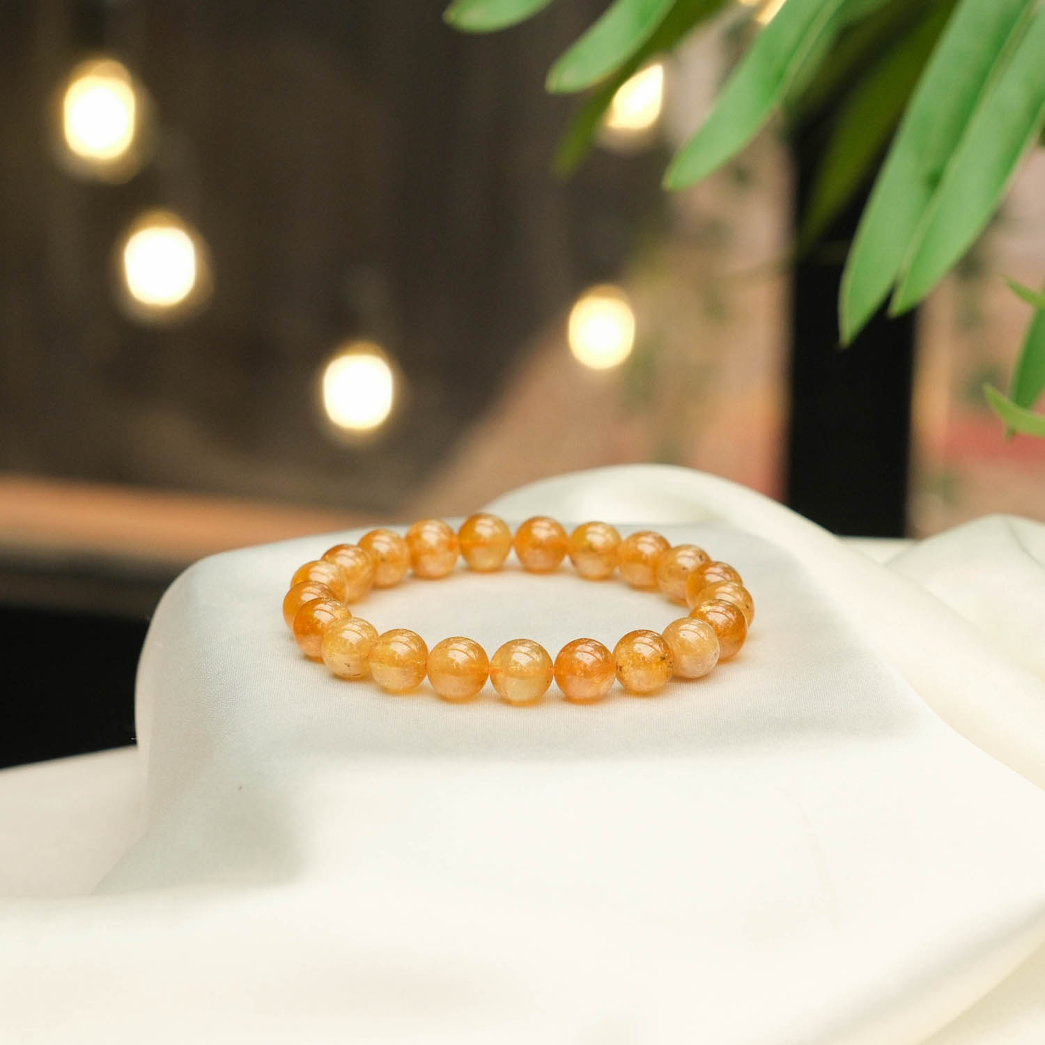 bracciale-pietra-tormalina-gialla-arancione-naturale-sfere-elegante Design-Armband aus originalen 8-9mm gelben und orangen Turmalin-Natursteinen im glatten Rundperlen-Schliff.