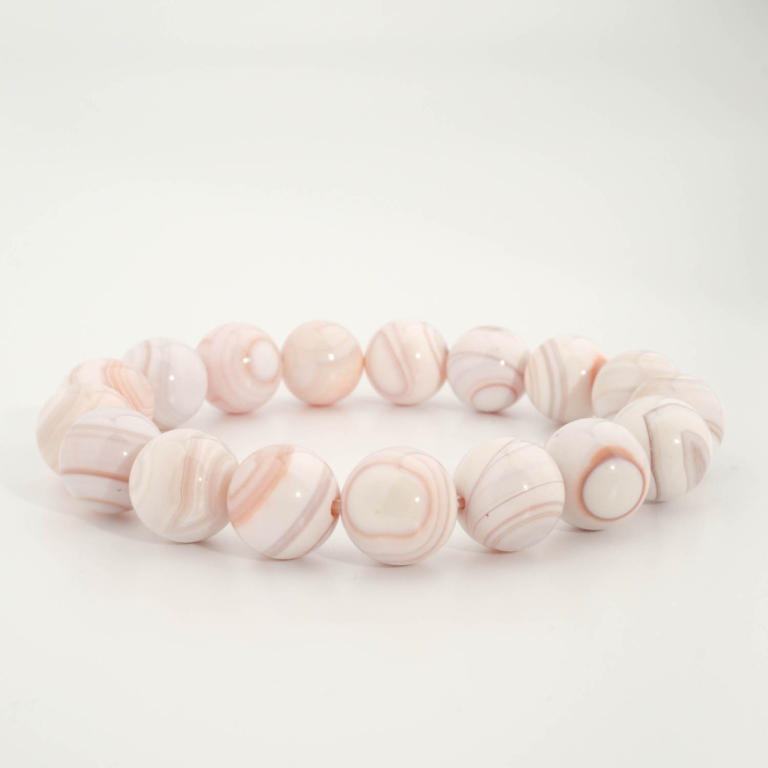 Bracciale di design ornato con sfere da 12-13mm di gemma di agata messicana originale 7A+ con sfumature rosa chiaro.