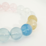 Bracelet de prestige orné de perles rondes de 11-12mm en morganite naturelle originale de qualité 7A+.