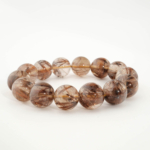 A luxury statement gemstone bracelet featuring original 14.98-15.12mm 10A+ VIP grade copper golden rutilated quartz round beads with certification.