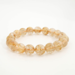 A luxury statement gemstone bracelet featuring original 10.22-10.28mm 10A+ VIP grade golden rutilated quartz round beads with international certification.