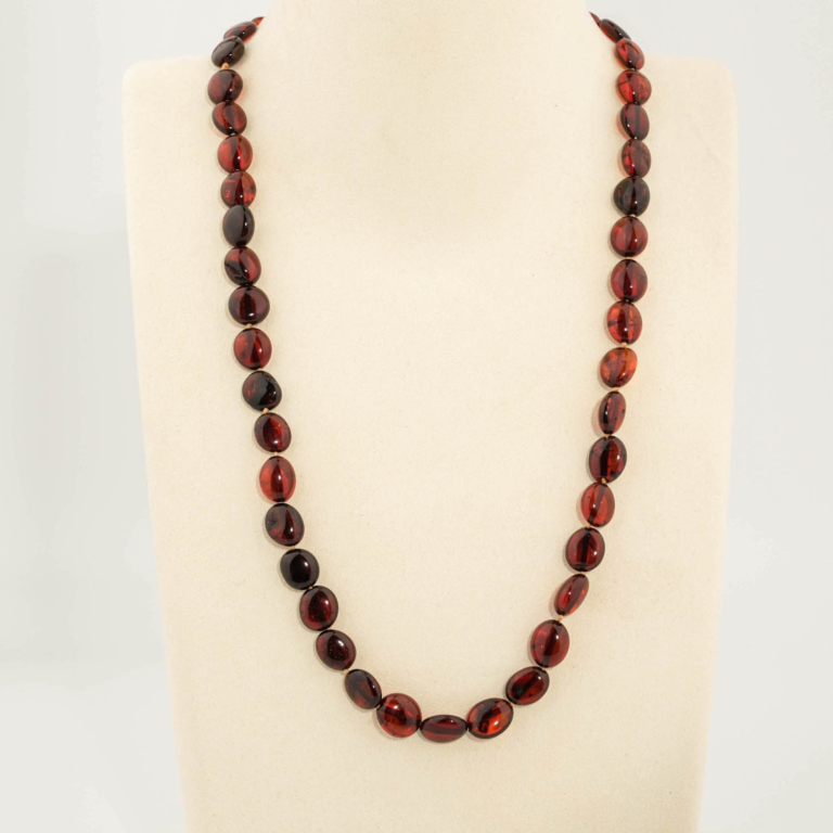 Collana da adulto in ambra baltica naturale originale certificata da 15-18g con grani color cognac scuro.
