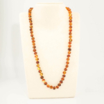 Collana da adulto in ambra baltica naturale originale certificata da 20-23g con grani color cognac.