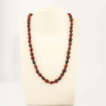 A certified original Baltic amber gemstone adult necklace (20-25g, 53-58cm) featuring smooth dark cherry amber beads.
