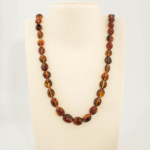 Collana da adulto in ambra baltica naturale originale certificata da 25-30g con grani color cognac.