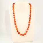A certified original Baltic amber gemstone adult necklace (27-30g, 54-58cm) featuring smooth large cognac amber beads.