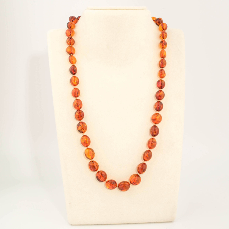 A certified original Baltic amber gemstone adult necklace (27-30g, 54-58cm) featuring smooth large cognac amber beads.