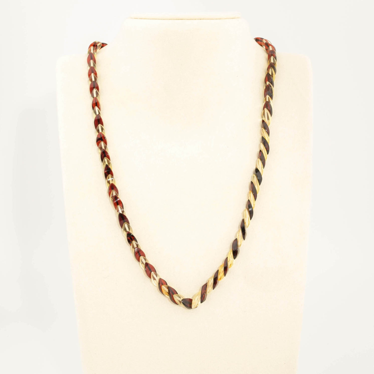 Collana da adulto in ambra baltica naturale originale certificata da 7-10g con grani bicolore sfacettati a torsione.