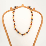 Collana da neonato in ambra baltica naturale originale certificata da 5-7g con grani multicolore e nodi di sicurezza.