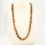 Collier pour adulte en ambre baltique naturel original certifié (23-28g, 60-65cm) avec perles de couleur cognac foncé.