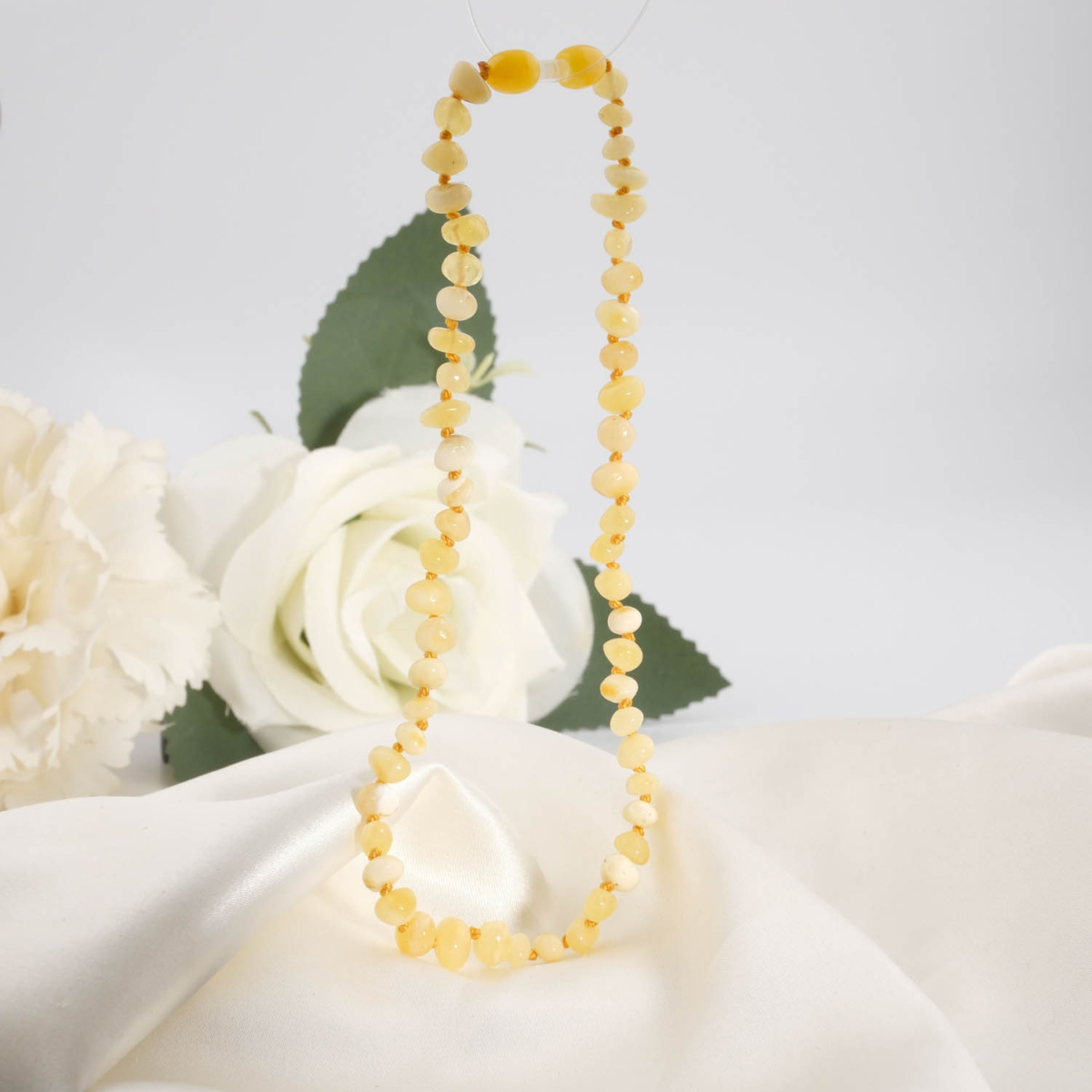 Echter zertifizierter baltischer Bernstein Naturstein Baby-Kette (5-7g) in Butterscotch-Gelb mit Sicherheitsknoten.
