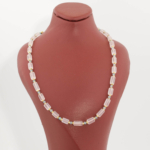 Collier de design pour femme en argent 925 (40+5cm) avec quartz rose cylindrique, topaze bleue et hématite dorée.