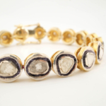 Bracelet de créateur de 19cm orné de diamants naturels originaux sertis sur argent 925.