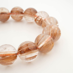 Bracelet de luxe orné de perles rondes de 14,54-14,56mm en quartz rutile cuivre et or naturel original de qualité 10A+ VIP.