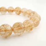 Bracciale di design di lusso ornato con sfere da 10,22-10,28mm di gemma di quarzo rutilato oro originale 10A+ VIP con certificato.